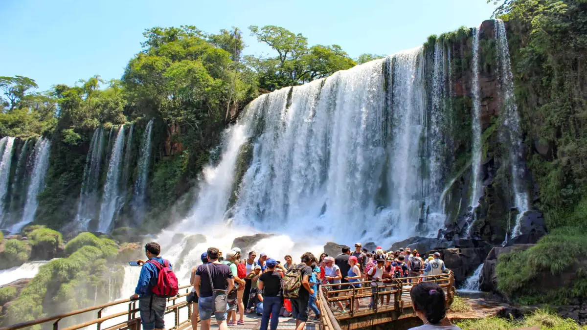 Best time at Iguazu Falls Tourists having fun at the Iguazu Falls
