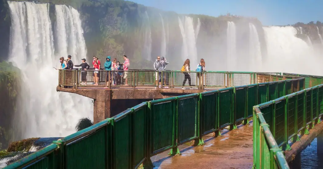 Tourists enjoying their tour of Iguazu Falls