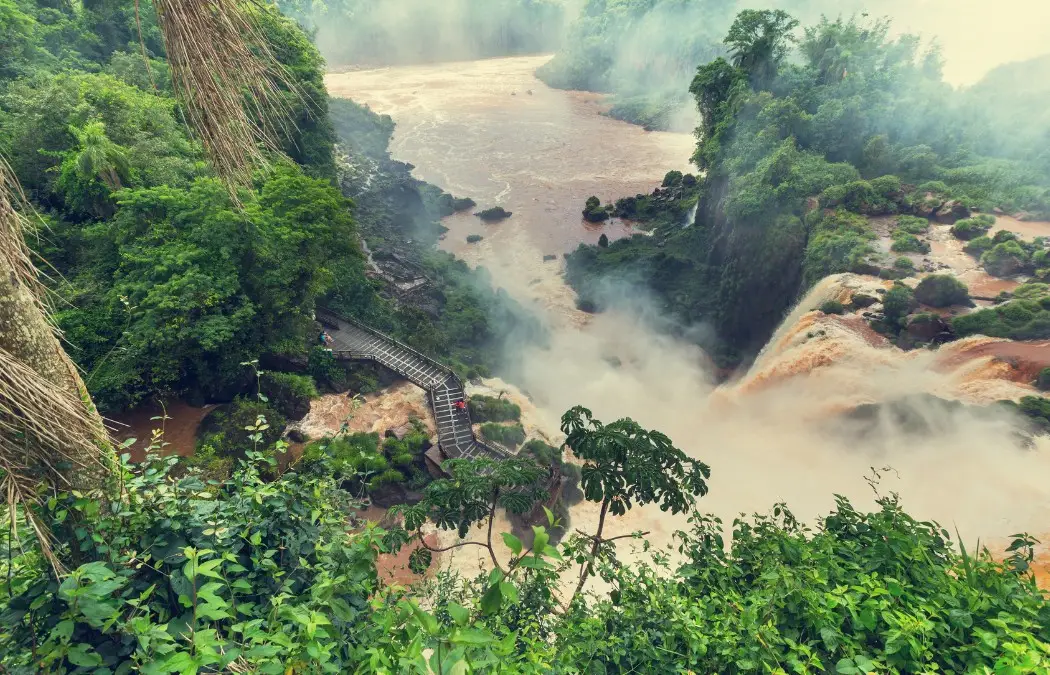 The beautiful waterfalls covered by rainforest