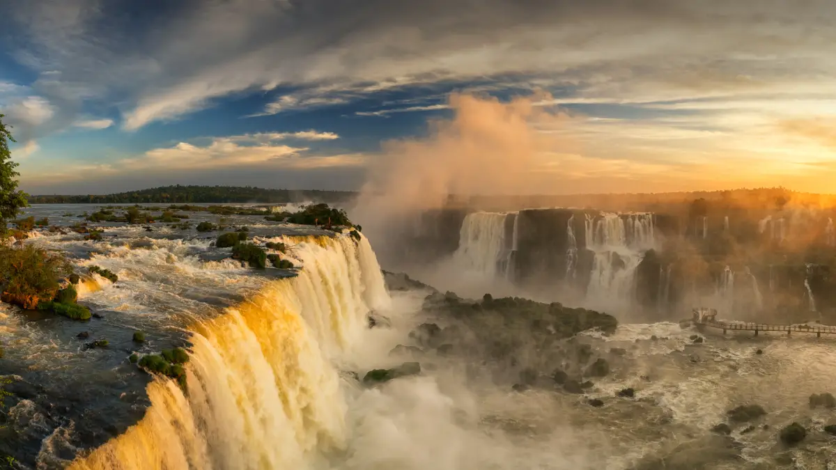 Iguazu Falls at sunset A spectacular view of the Iguazu Falls during sunset