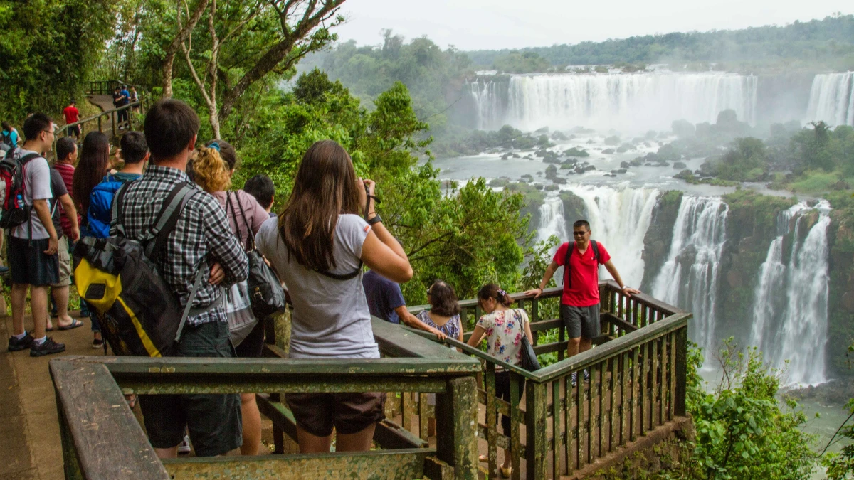  Visitors enjoying their time admiring and touring the Iguazu Falls