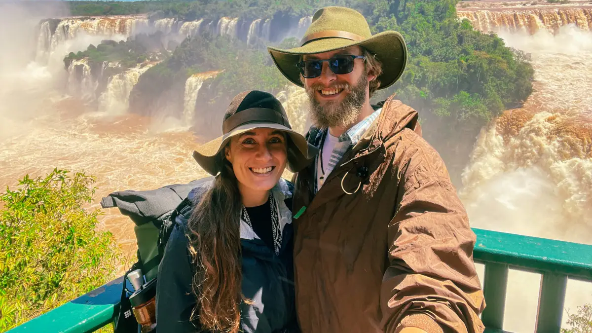 A couple enjoying their time in Iguazu Falls